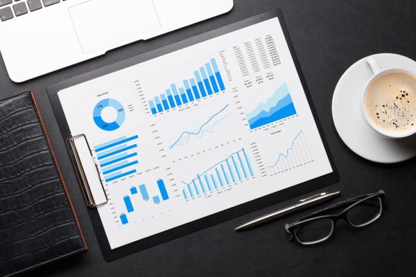 Office workplace table with charts